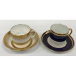 A Royal Crown Derby royal blue gilt and jewelled banded set of six coffee cans and saucers together