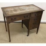 An Edwardian mahogany single pedestal desk,