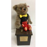 A Steiff Auctioneer bear dated 2008 limited edition 489 of 1500 with rostrum and teddy bear lot