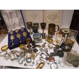 A box of sundry plated wares to include a tankard, goblets, cutlery etc,