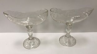 A pair of 19th Century cut glass comports or sweetmeat dishes,