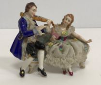 A collection of various Continental figure groups in the Meissen or Dresden manner including