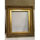 Four various swept giltwood and gesso picture frames 98 cm x 111 cm, 84 cm x 112 cm,