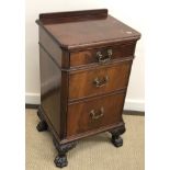 A circa 1900 mahogany bedside cupboard by Howard & Sons,