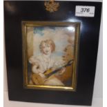 MARY A MILLINGTON "Young girl playing the guitar" oil on ivory, unsigned,