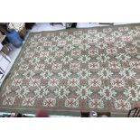 A late 20th Century machine woven Wilton style rug,