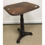 A Victorian figured mahogany pedestal occasional table,