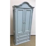 A modern painted pine armoire of small proportions in the Louis XV taste with two cupboard doors