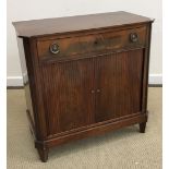 A circa 1900 mahogany side cabinet in the Georgian style the plain top above a single drawer and
