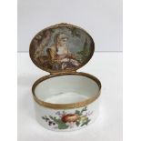 A fine 18th Century Continental porcelain oval box, probably Meissen, the top painted with fruit,