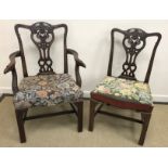 A set of four early 20th Century mahogany Hepplewhite design elbow chairs with tapestry upholstered