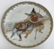 A circa 1900 Japanese Meiji Period Satsuma ware plate decorated with two figures,