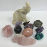 A collection of carved stone items including three Chinese soapstone figures of sages,