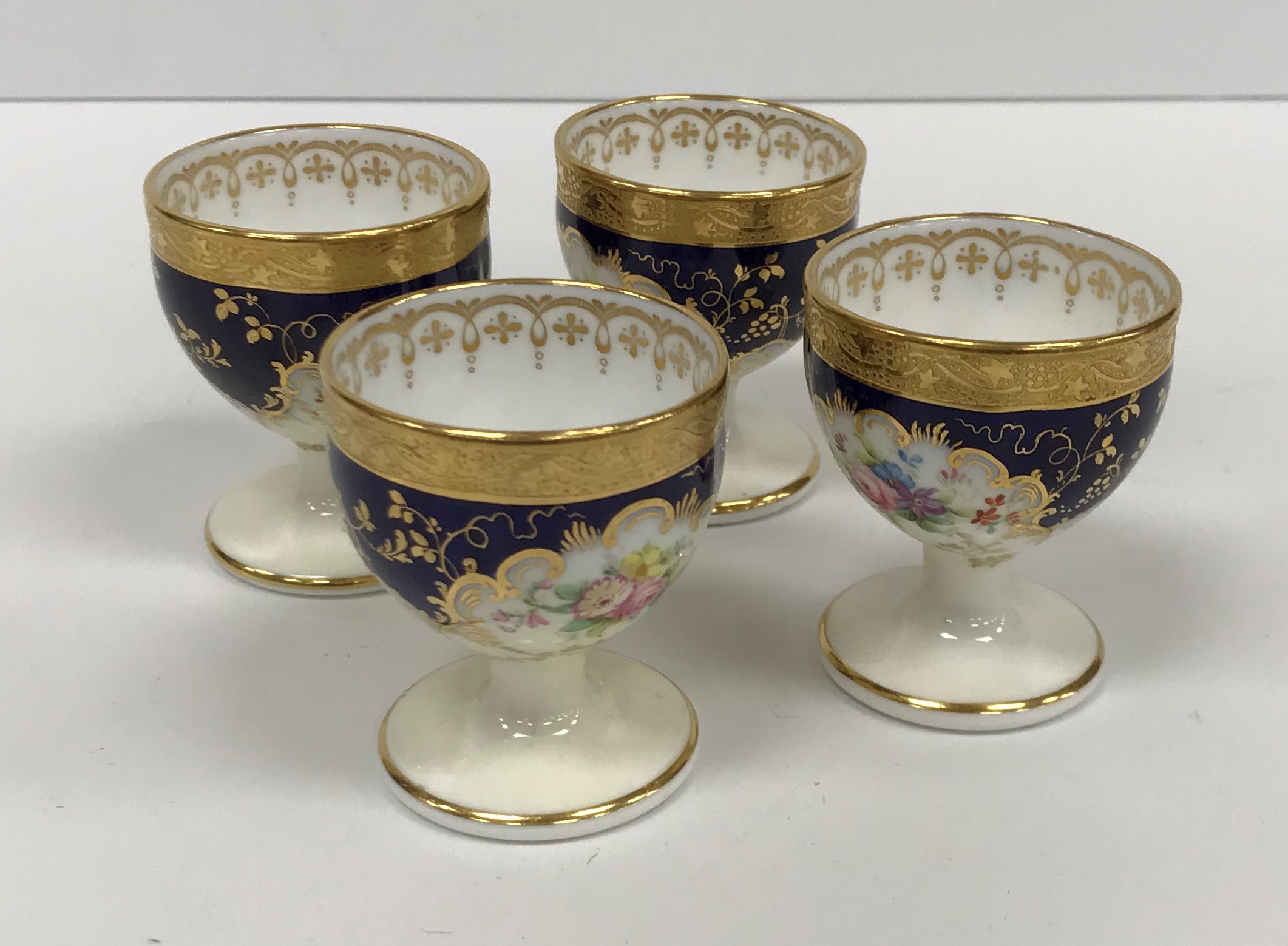 A Mintons floral spray blue and gilt decorated part tea service comprising six cups and saucers, - Image 6 of 25