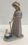 A Lladro figure of The Lamplighter (5205) 47 cm high,