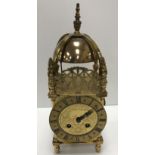 An early 20th Century brass cased lantern clock, the movement by Japy Frères, No'd.