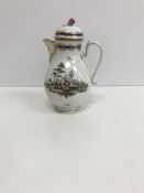 An 18th Century Vienna jug and cover, the cover with pear shaped finial,