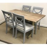 A modern oak and painted refectory style kitchen table on end trestle supports 145 cm x 75 cm x 75.