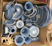 A collection of pale blue Jasperware including vases, trinket boxes, mantel clock, Christmas plates,