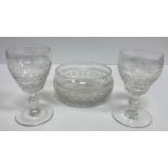 A set of sixteen lozenge and facet cut stemmed drinking glasses and ten matching rinsers