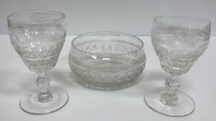 A set of sixteen lozenge and facet cut stemmed drinking glasses and ten matching rinsers
