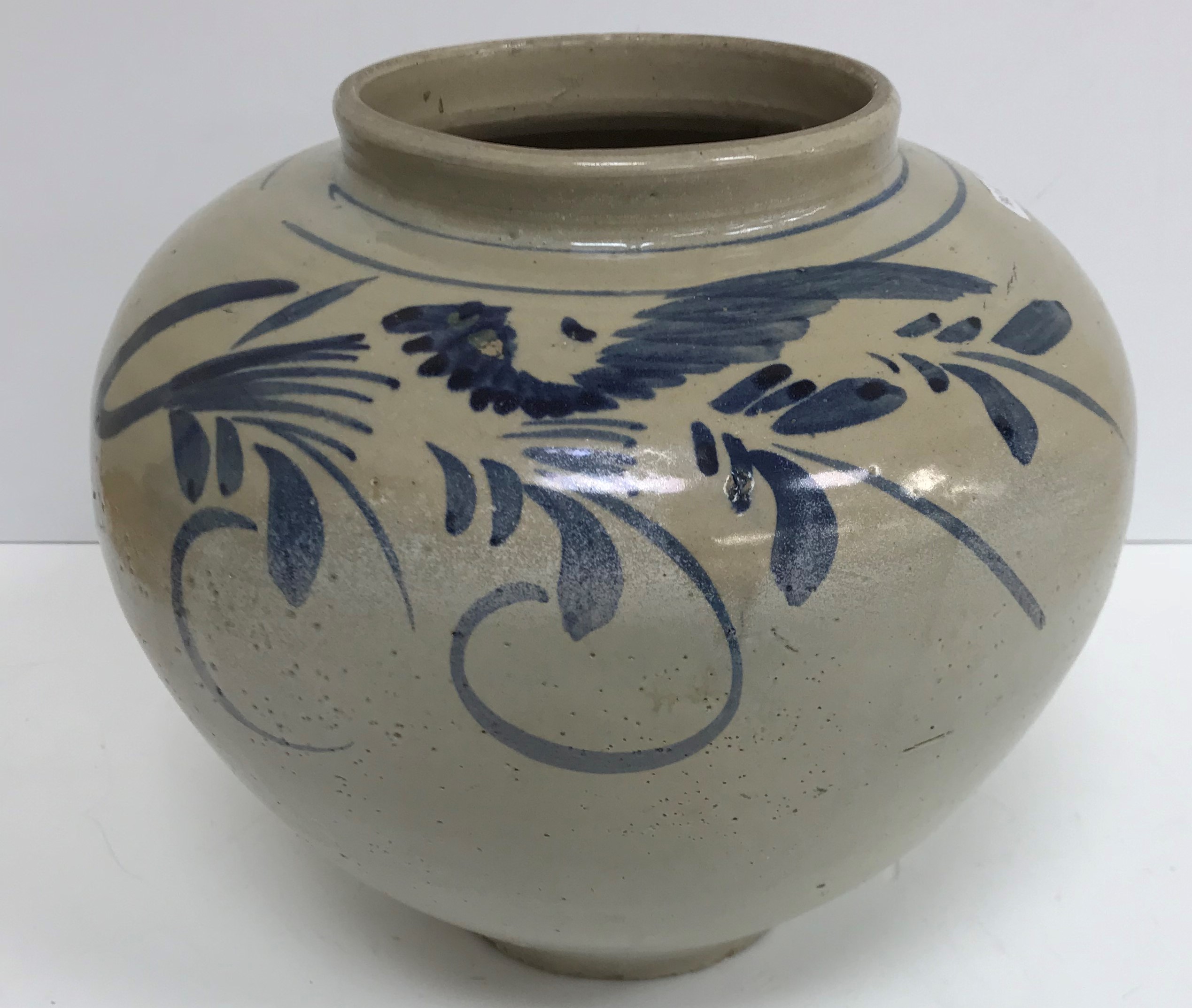 A 19th Century Korean glazed pottery jar (Hwang-Hae-Do) of globular form,