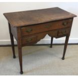 A 19th Century oak lowboy,