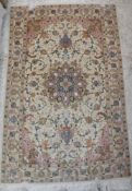 A part silk Persian rug,