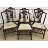 A set of six circa 1900 mahogany Hepplewhite design dining chairs with needlework upholstered drop