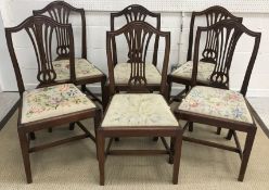 A set of six circa 1900 mahogany Hepplewhite design dining chairs with needlework upholstered drop