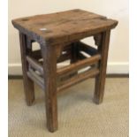 A 19th Century Chinese elm stool,