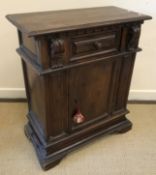 An 18th Century Italian walnut side cabinet of small proportions,