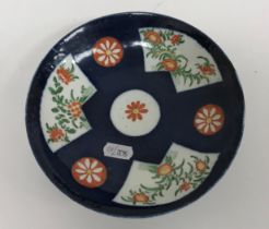 An 18th Century Worcester type shallow dish in the Chinese taste,