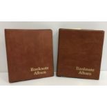 Two bank note albums containing 262 various World and GB bank notes including a Bank of England £5