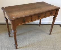 A Victorian Gothic Revival pitch pine side table,