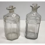 A pair of late 18th Century faceted and wrythen cut decanters and stoppers the scalloped rims with