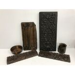 A box containing assorted treen wares to include carved oak furniture embellishment panels,