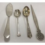 A collection of various Indian and other silver / white metal teaspoons,