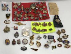 A large collection of commemorative pin badges to include Victoria 60 years/longest reign badges,