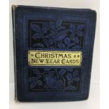 A collection of five albums of various Victorian and later Christmas cards and postcards various,