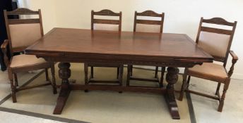 An Old Charm oak refectory style dining table, the rectangular top with two draw leaves,