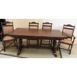 An Old Charm oak refectory style dining table, the rectangular top with two draw leaves,