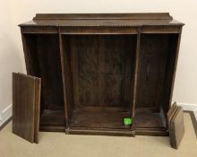 A near matching pair of early 20th Century oak open bookcases with adjustable shelving 142 cm wide