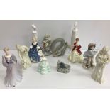 A collection of figurines comprising Coalport Ladies of Fashion - Enchantress,