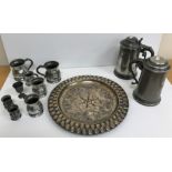 A collection of seven 19th Century pewter baluster shaped measures,