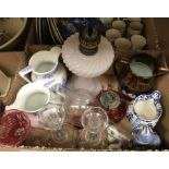 Two boxes of assorted china and glassware to include a pair of glass candlesticks,