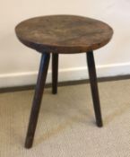 A 19th Century fruitwood cricket table,