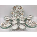 A Minton Haddon Hall eight place tea set comprising cups, saucers,
