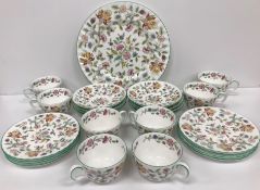 A Minton Haddon Hall eight place tea set comprising cups, saucers,