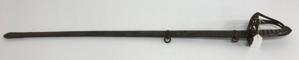 A British 1845 pattern Infantry Officer's dress sword, the engraved blade with Royal insignia,